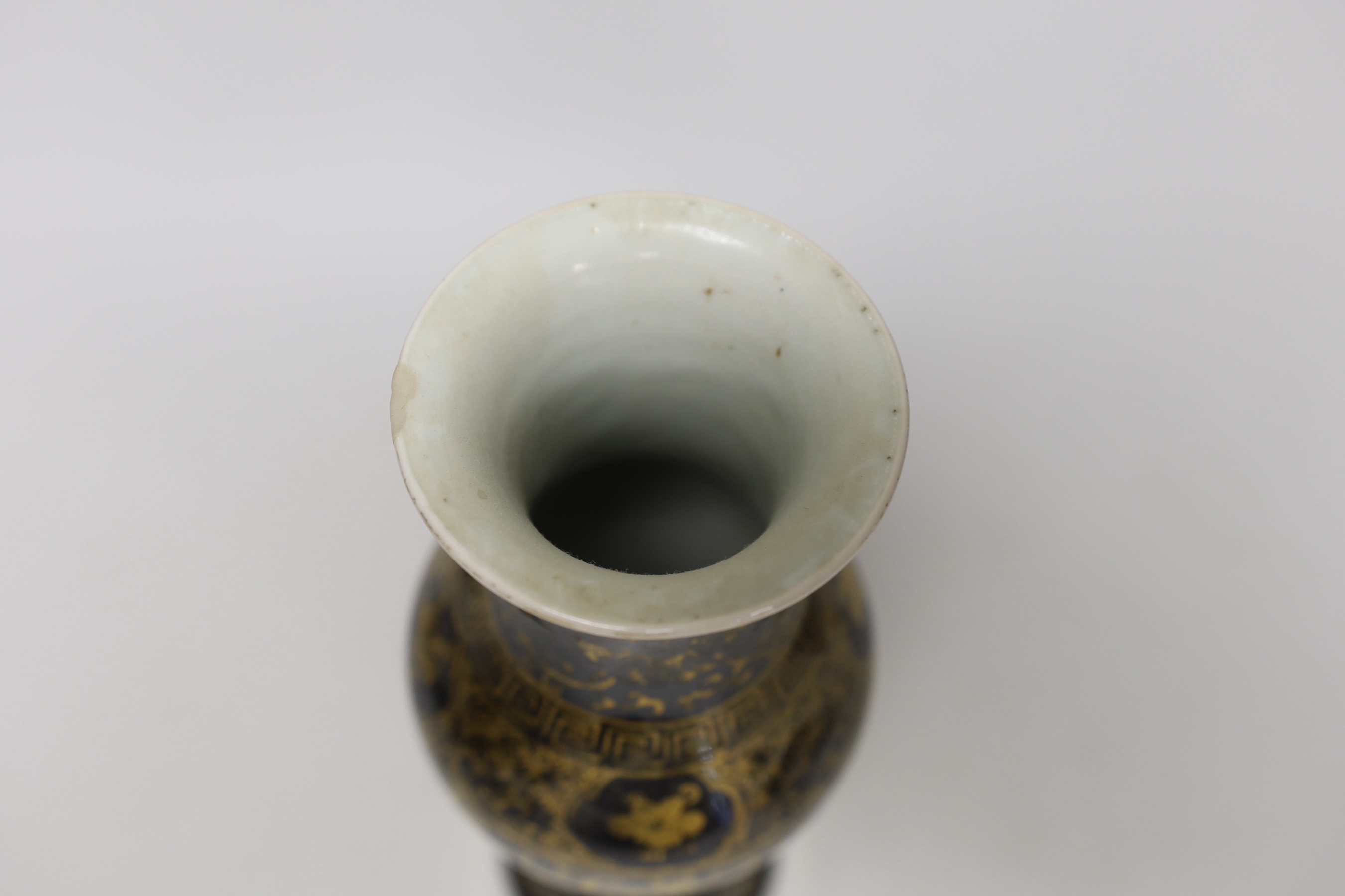 A Chinese gilt decorated mirror black glazed baluster vase, 25.5cm high